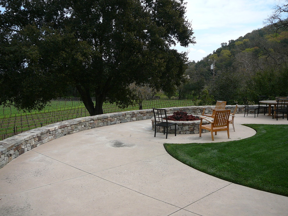 Photo of a mediterranean patio in San Francisco with a fire feature.