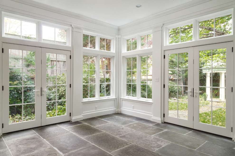 Traditional sunroom in DC Metro with slate floors.