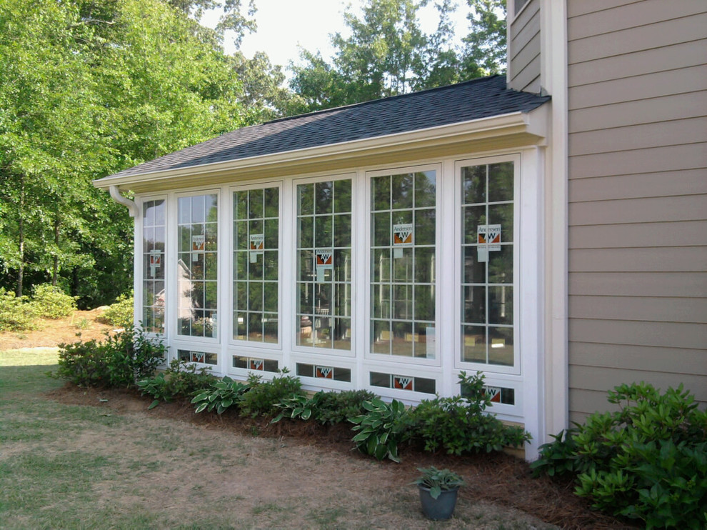 This is an example of a traditional sunroom in Atlanta.