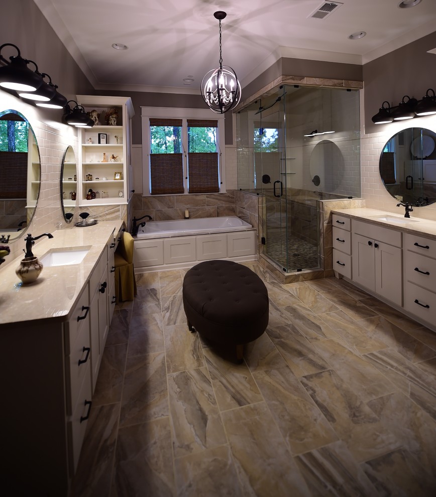 Inspiration for a large rustic master multicolored tile and subway tile porcelain tile drop-in bathtub remodel with shaker cabinets, white cabinets, granite countertops, a two-piece toilet and gray walls