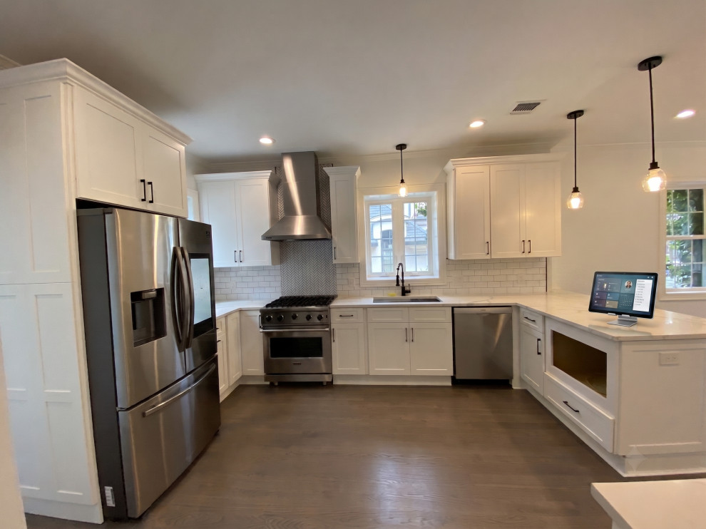 White Shaker Kitchen with Herringbone Backsplash