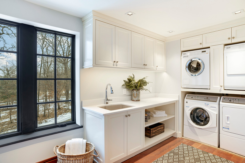 This is an example of a transitional laundry room in Minneapolis.