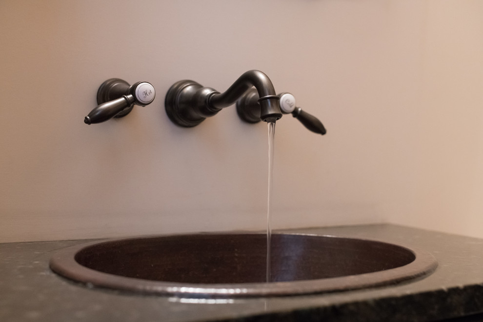 Small mountain style multicolored tile and porcelain tile home design photo in Philadelphia with recessed-panel cabinets, medium tone wood cabinets, a drop-in sink and granite countertops