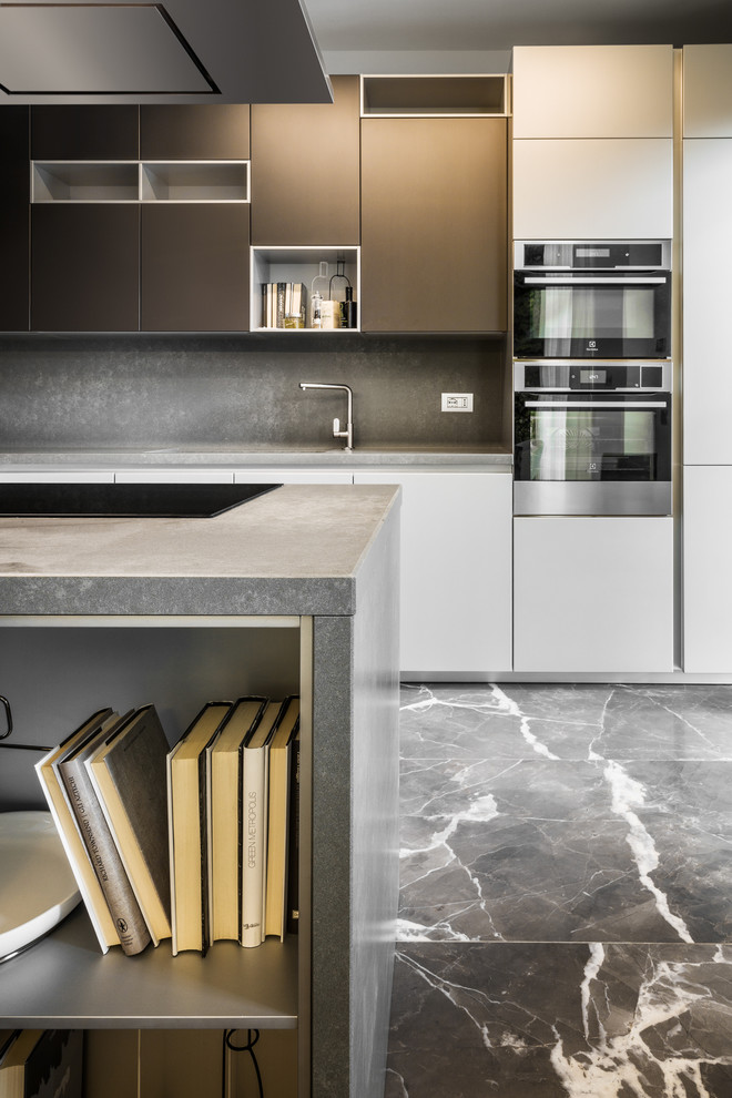 Modern kitchen in Milan with porcelain floors and grey floor.