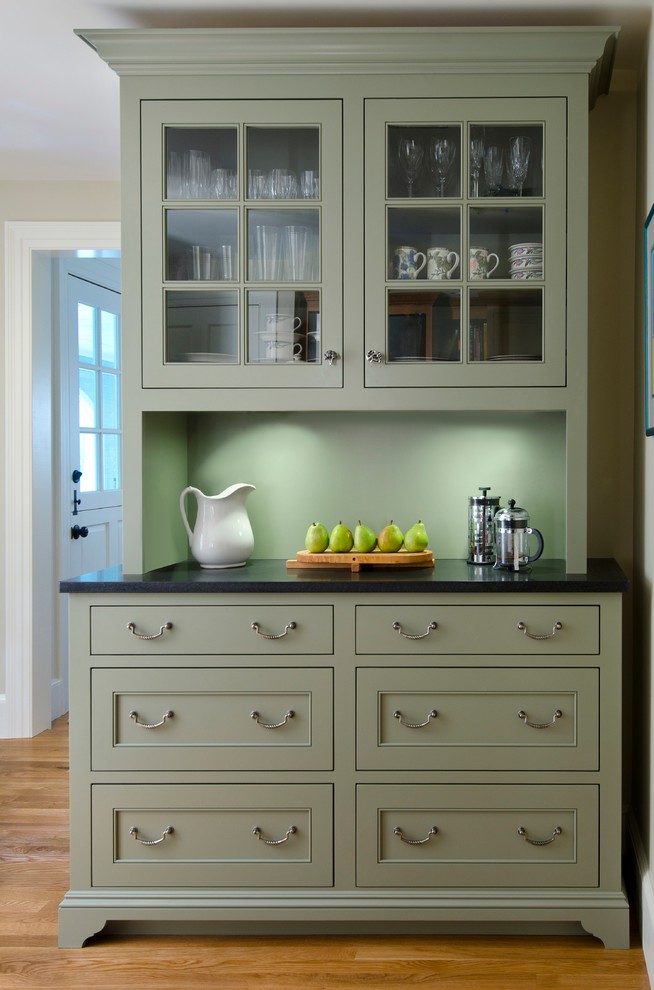 Traditional eat-in kitchen in Boston with green cabinets and granite benchtops.