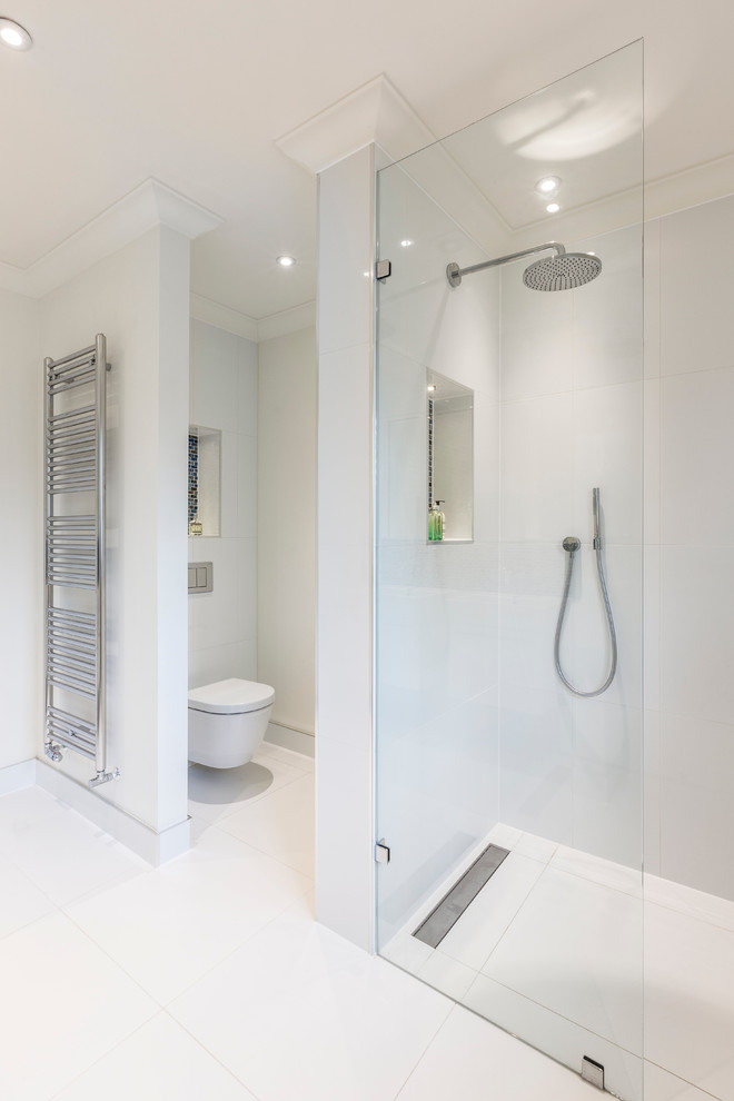 Design ideas for a mid-sized contemporary bathroom in Surrey with an enclosed toilet.