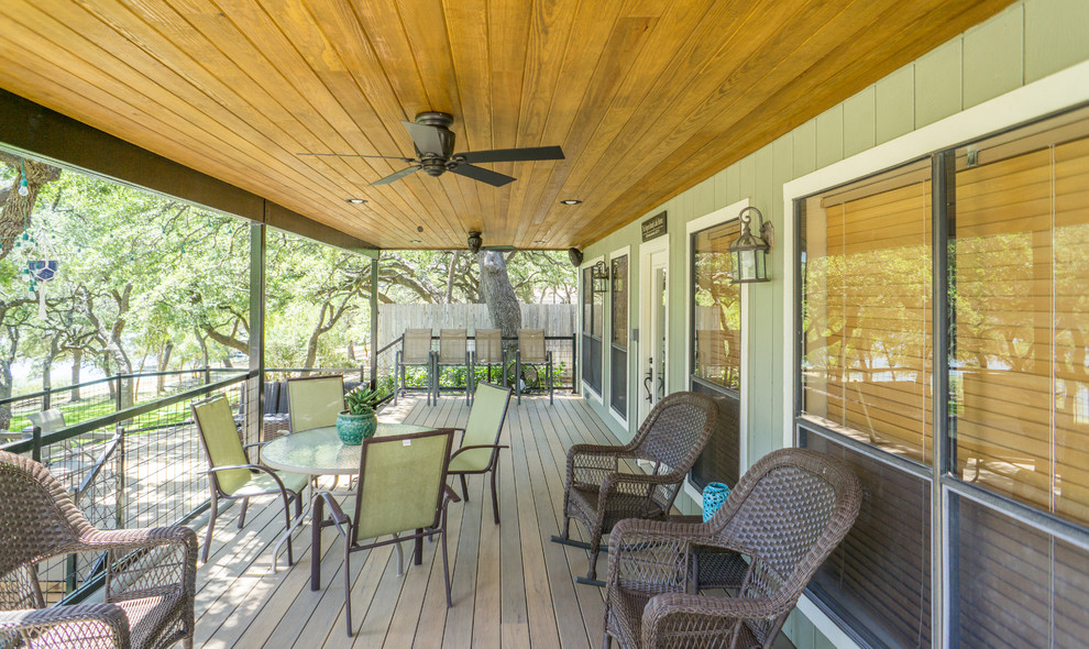 Large mountain style backyard balcony deck photo in Austin