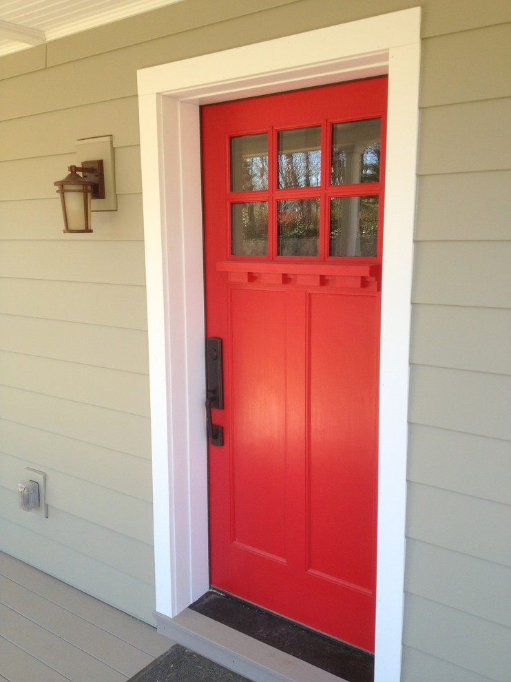 This is an example of a small arts and crafts front door in Philadelphia with a single front door and a red front door.