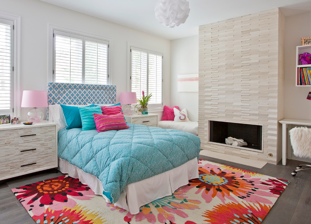 Contemporary kids' room in Chicago with white walls and medium hardwood floors for girls.