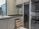 Contemporary Laundry Room by Heritage Design Studio