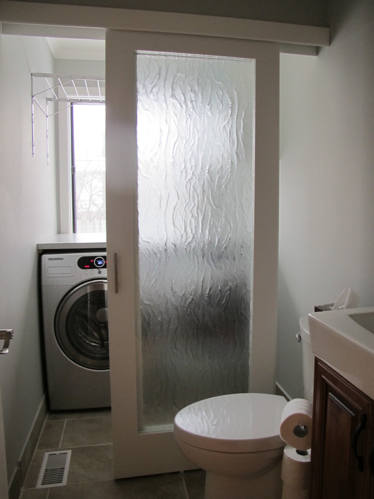 Photo of a traditional laundry room in Montreal.