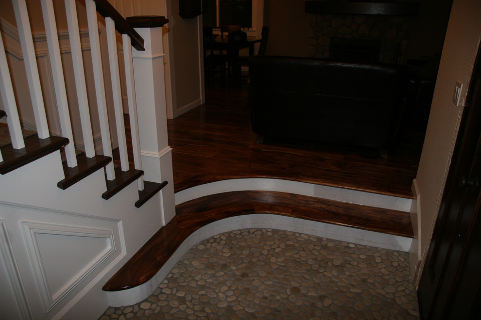 Photo of a large traditional carpeted straight staircase in San Francisco with carpet risers.