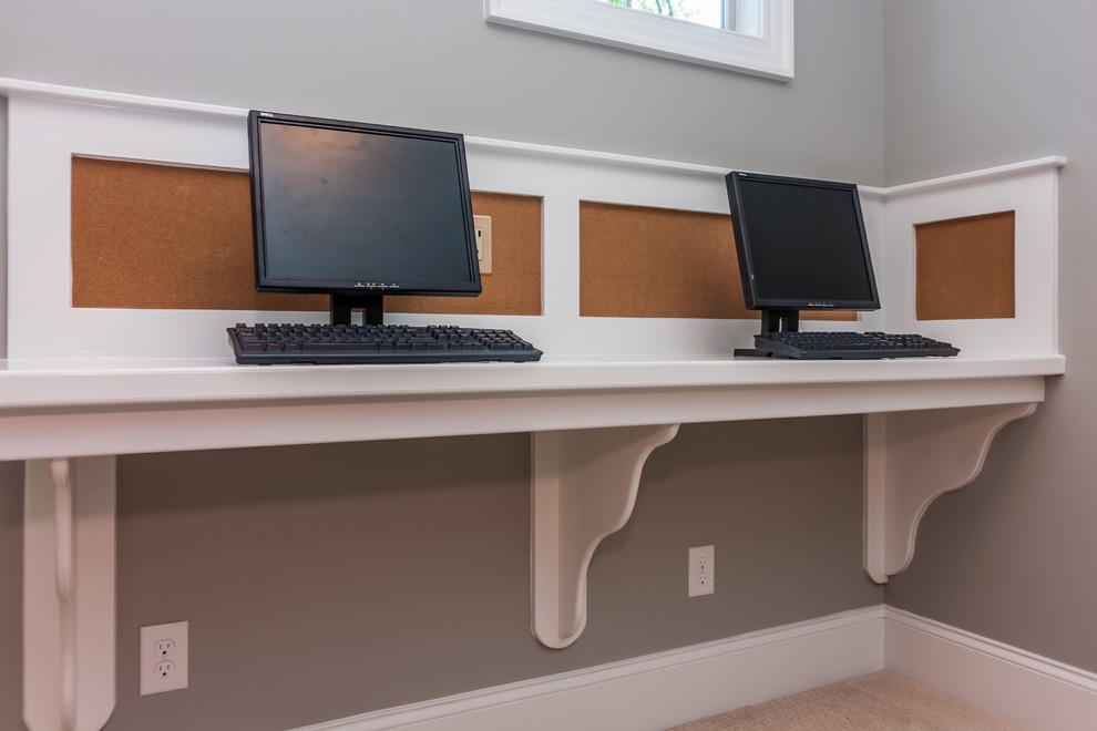 Photo of a transitional home office in Raleigh.