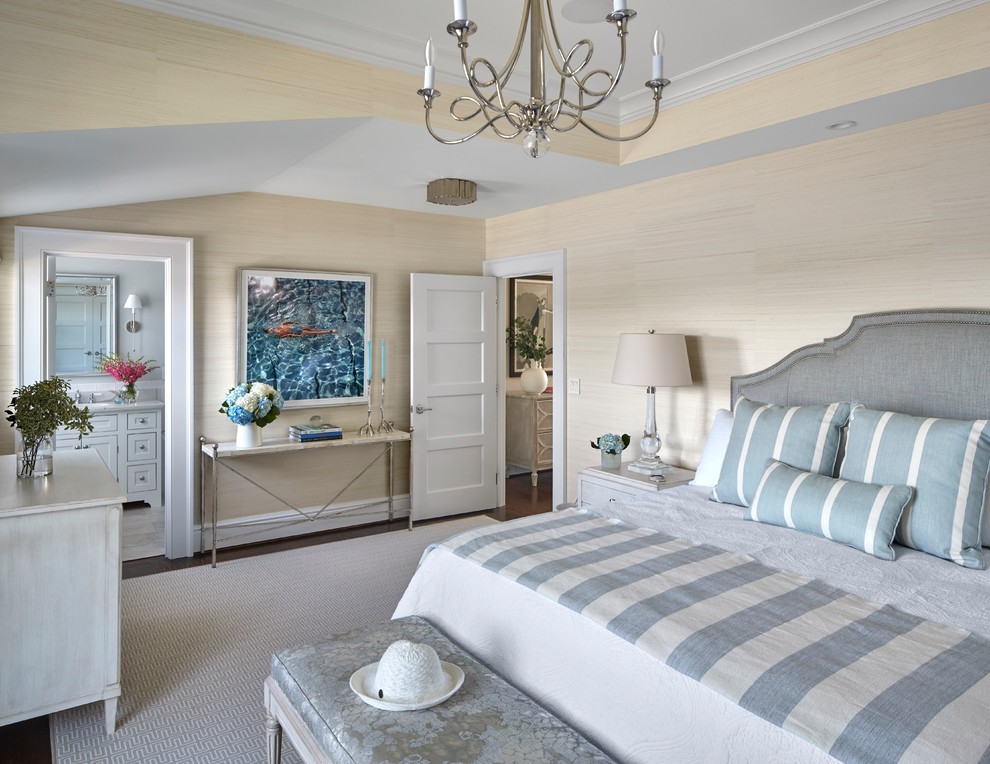 This is an example of a mid-sized beach style guest bedroom in Bridgeport with grey walls, medium hardwood floors, no fireplace and brown floor.