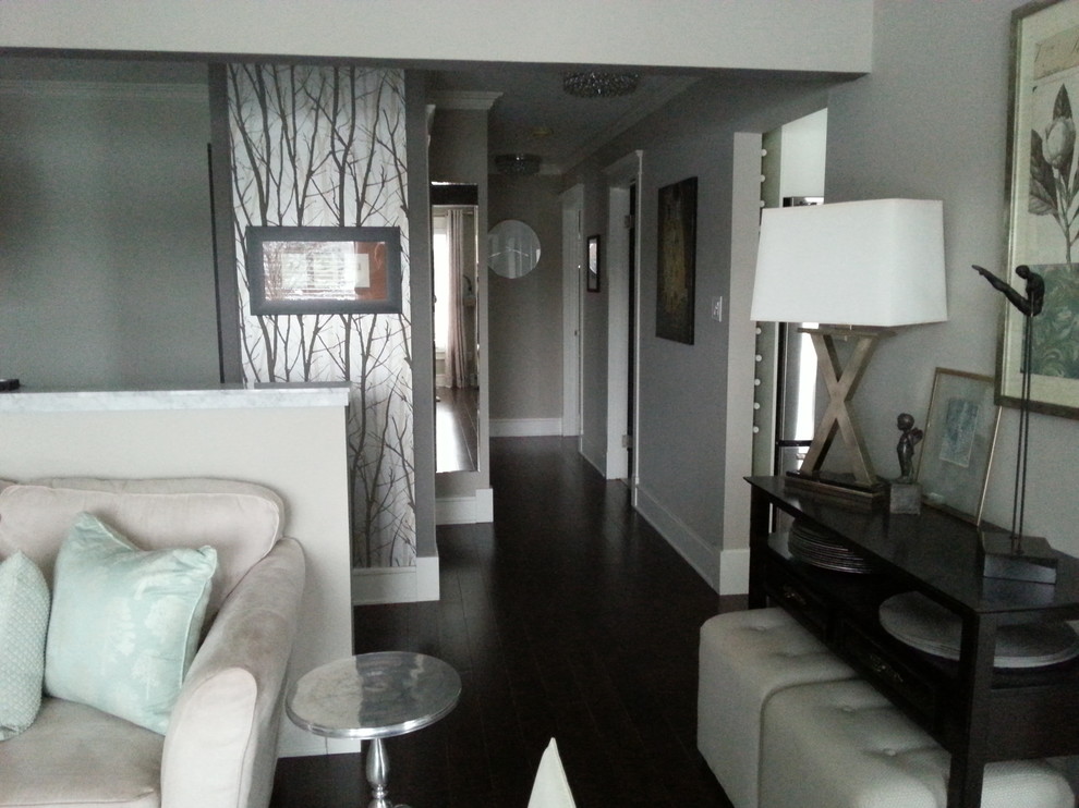 Inspiration for a large transitional hallway in Toronto with medium hardwood floors.