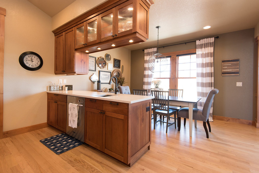 Example of a transitional kitchen design in Denver