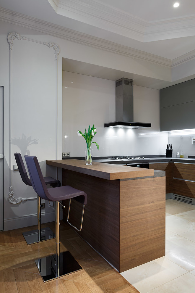 This is an example of a contemporary kitchen in Saint Petersburg.