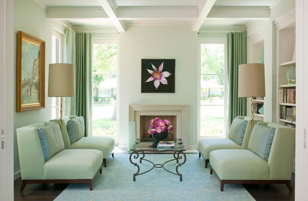 Transitional living room library photo in Dallas with white walls and a standard fireplace