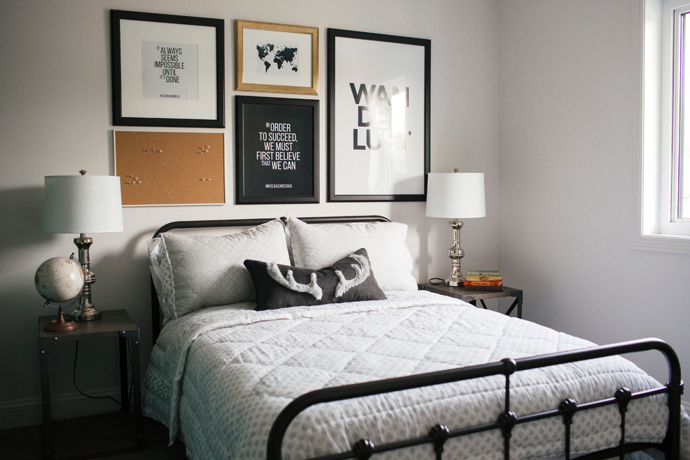 Design ideas for an industrial guest bedroom in Other with white walls.