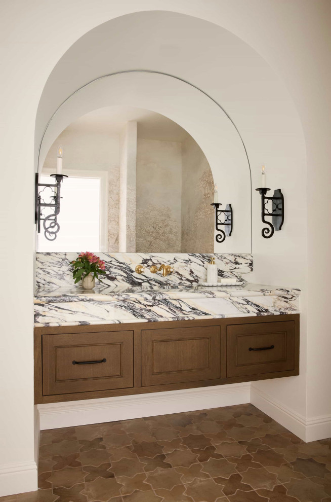 Tuscan powder room photo in Los Angeles