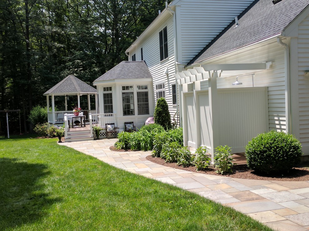 Large traditional backyard patio in Bridgeport with an outdoor shower, decking and a gazebo/cabana.