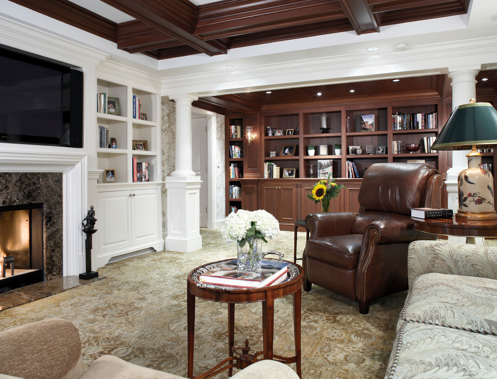Design ideas for a large traditional enclosed living room in Boston with a library, a standard fireplace and a built-in media wall.