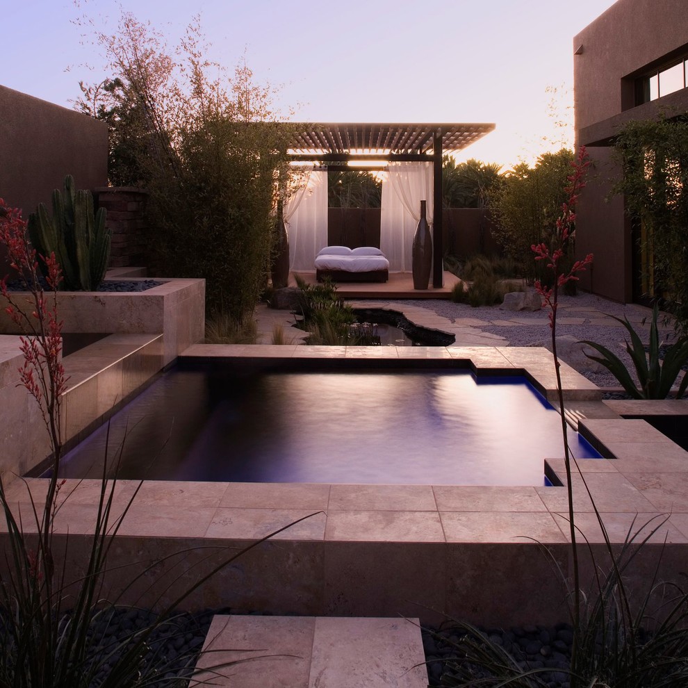 Contemporary patio in Las Vegas with a water feature.
