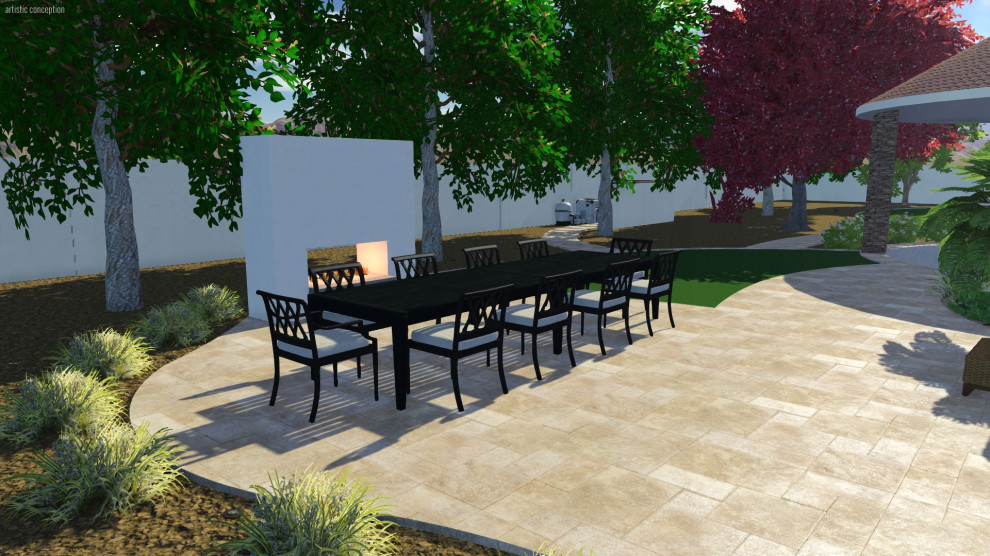 Photo of an expansive transitional backyard patio in Phoenix with concrete pavers.