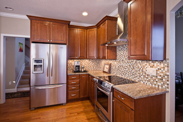 Example of a transitional kitchen design in Denver