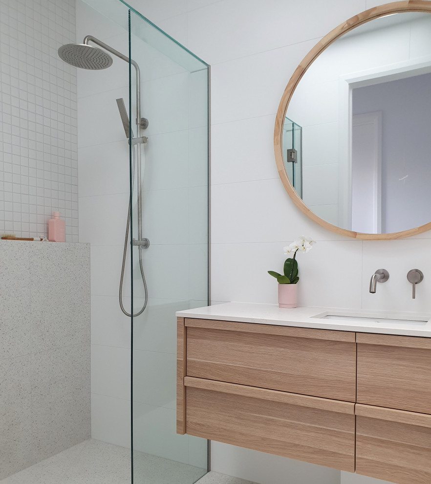 Photo of a contemporary bathroom in Melbourne with a corner shower.