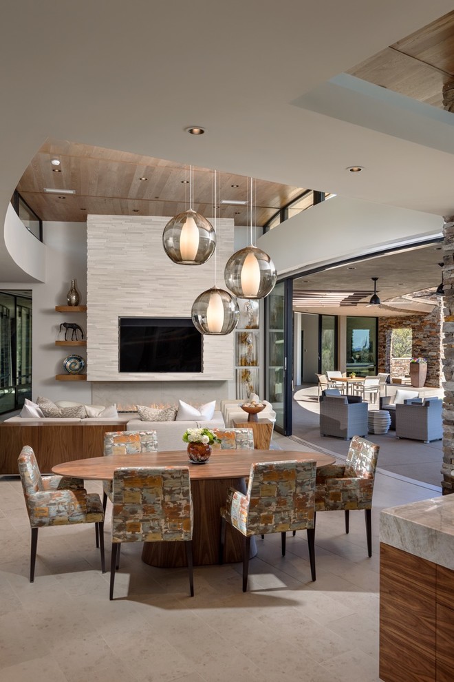 Inspiration for a large contemporary open plan dining in Los Angeles with white walls, no fireplace and beige floor.