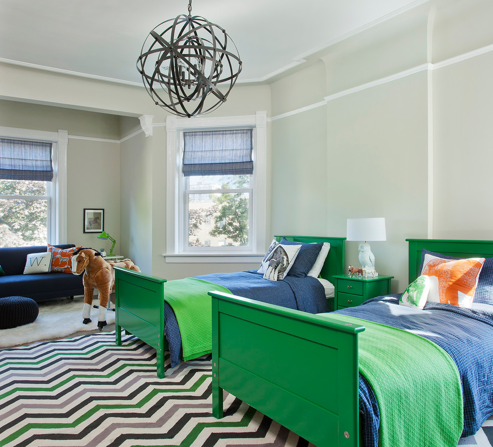 Design ideas for a large transitional kids' bedroom for kids 4-10 years old and boys in Chicago with carpet and green walls.
