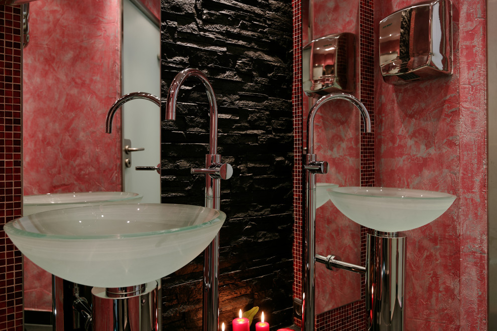 Inspiration for an expansive world-inspired cloakroom in Munich with a wall mounted toilet, red tiles, glass tiles, black walls, slate flooring, a console sink, glass worktops, black floors, feature lighting, a freestanding vanity unit and a drop ceiling.