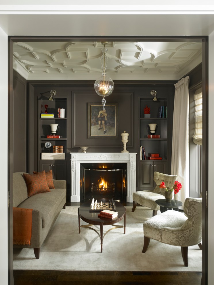 Traditional enclosed family room in Chicago with a standard fireplace and grey walls.