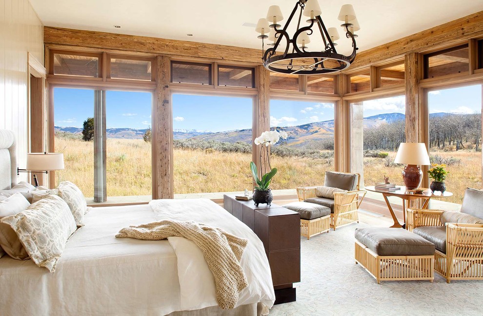 Large country master bedroom in Denver.