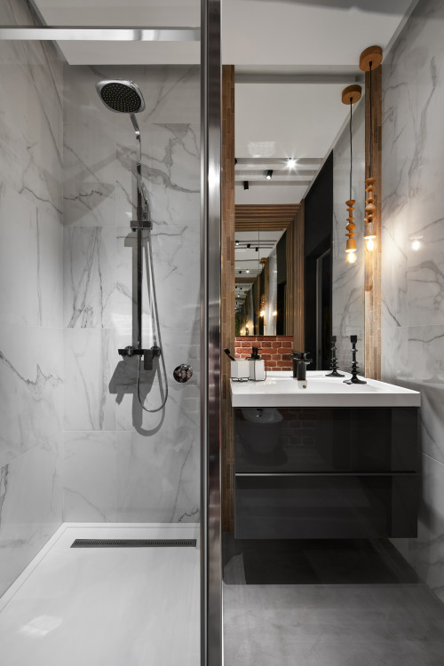 Balance of Warmth and Style: Small Industrial Bathroom with Dark Gray Cabinets