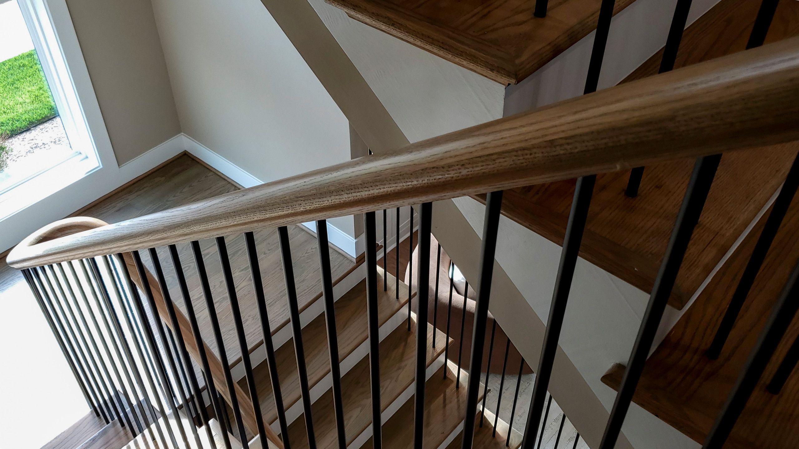 Project #153 | Sophisticated Red Oak Stair with Metal Balusters