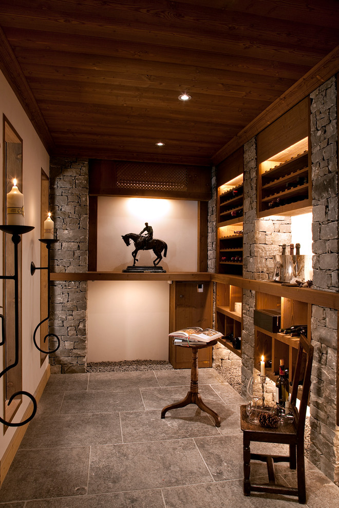 Inspiration for a country wine cellar in Other with storage racks.