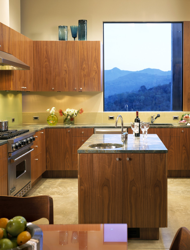 This is an example of a modern kitchen in San Francisco with flat-panel cabinets and medium wood cabinets.