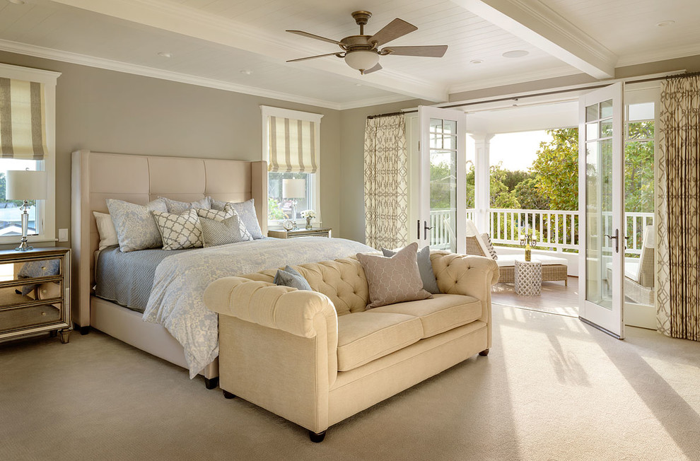 Design ideas for a traditional master bedroom in San Diego with carpet, beige floor and beige walls.