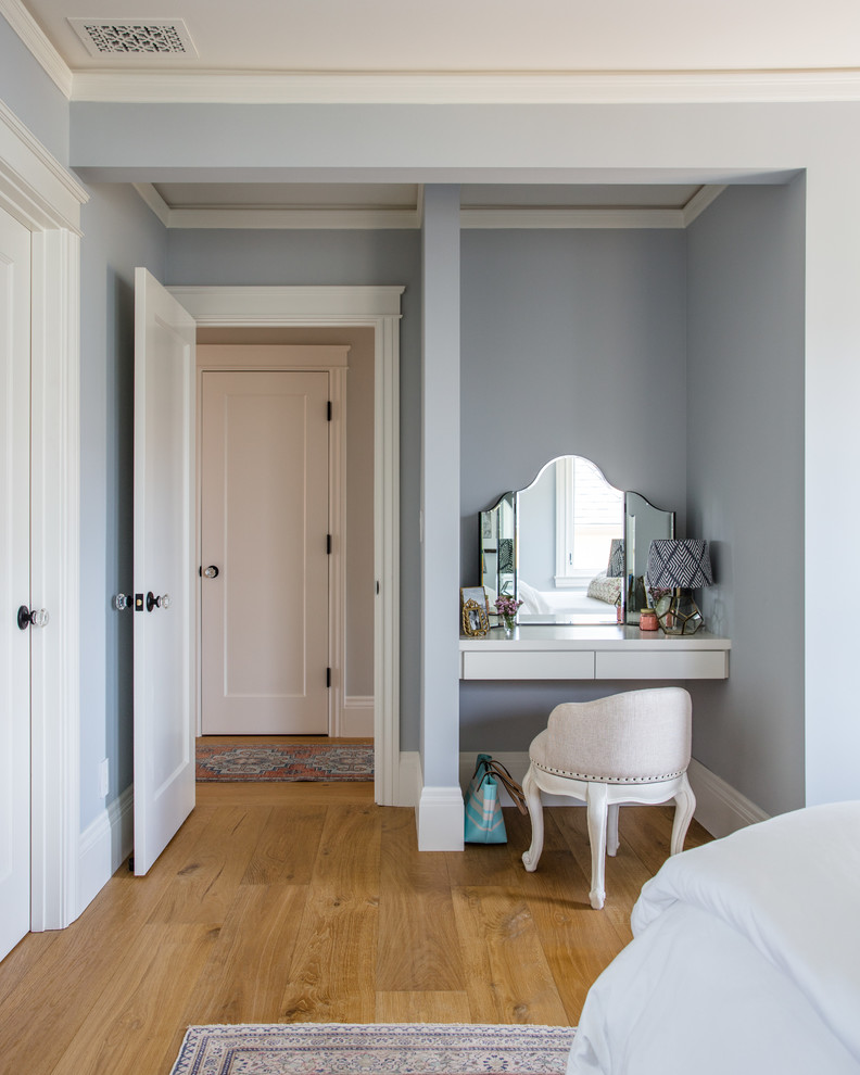 This is an example of a mid-sized transitional bedroom in San Francisco.