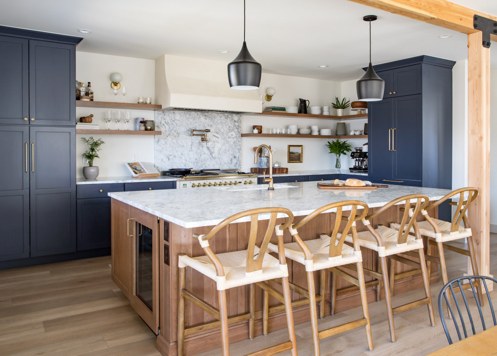 Example of a transitional kitchen design in Denver