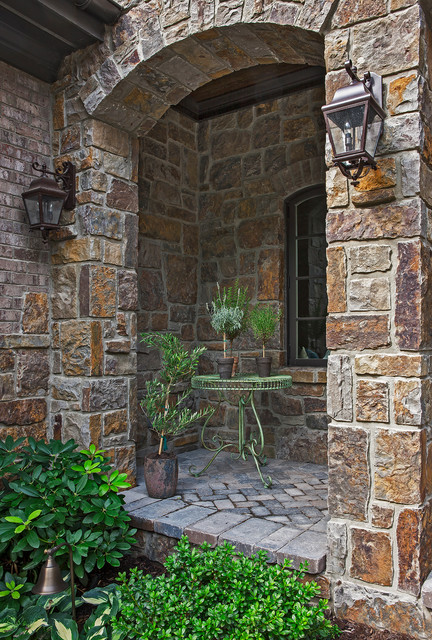 Old World Lake Home traditional-house-exterior