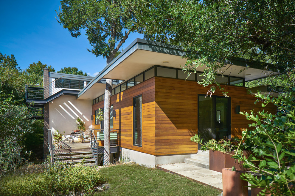 Inspiration for a contemporary two-storey house exterior in Austin.