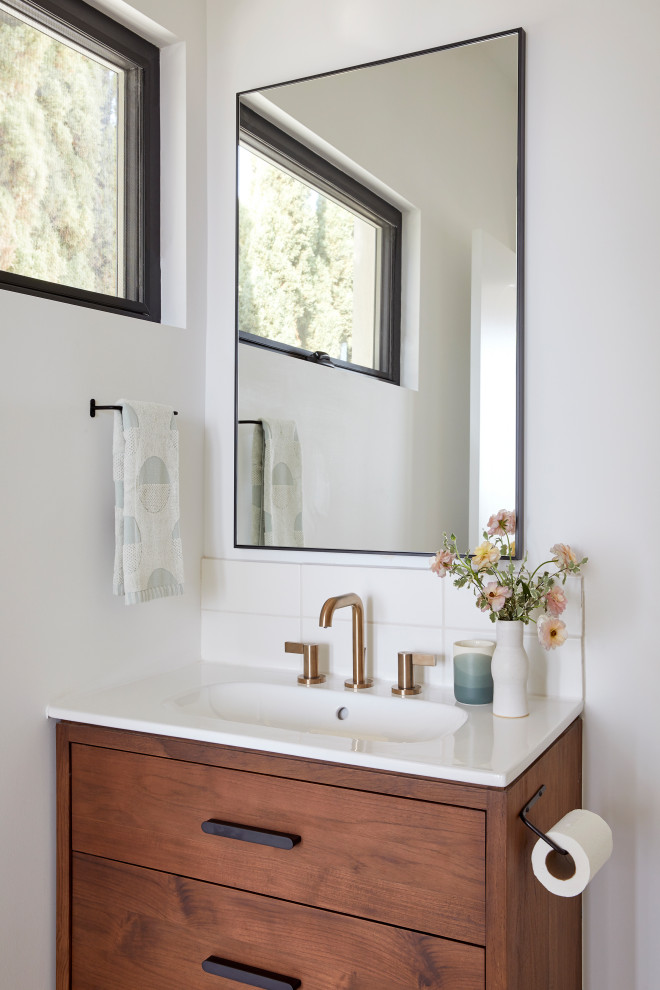 Large trendy kids' white tile and ceramic tile porcelain tile, gray floor and single-sink bathroom photo in San Francisco with furniture-like cabinets, brown cabinets, white walls, an integrated sink, quartz countertops, white countertops and a freestanding vanity
