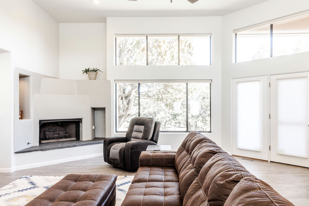 Example of a large transitional u-shaped vinyl floor and gray floor eat-in kitchen design with an undermount sink, shaker cabinets, gray cabinets, quartzite countertops, green backsplash, subway tile backsplash, stainless steel appliances, an island and white countertops