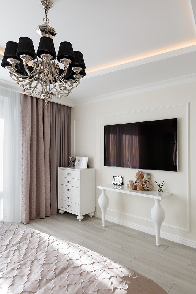 Inspiration for a mid-sized transitional master bedroom in Saint Petersburg with beige walls, laminate floors, no fireplace and grey floor.