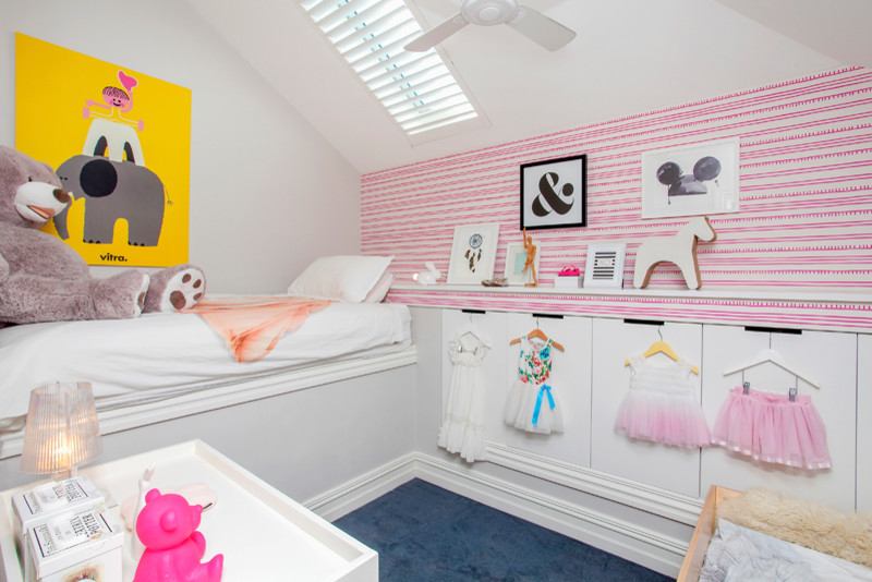 Large contemporary kids' bedroom in Sydney with white walls and carpet for kids 4-10 years old and girls.