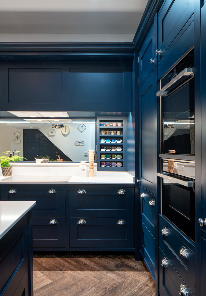 Example of a transitional kitchen design in London