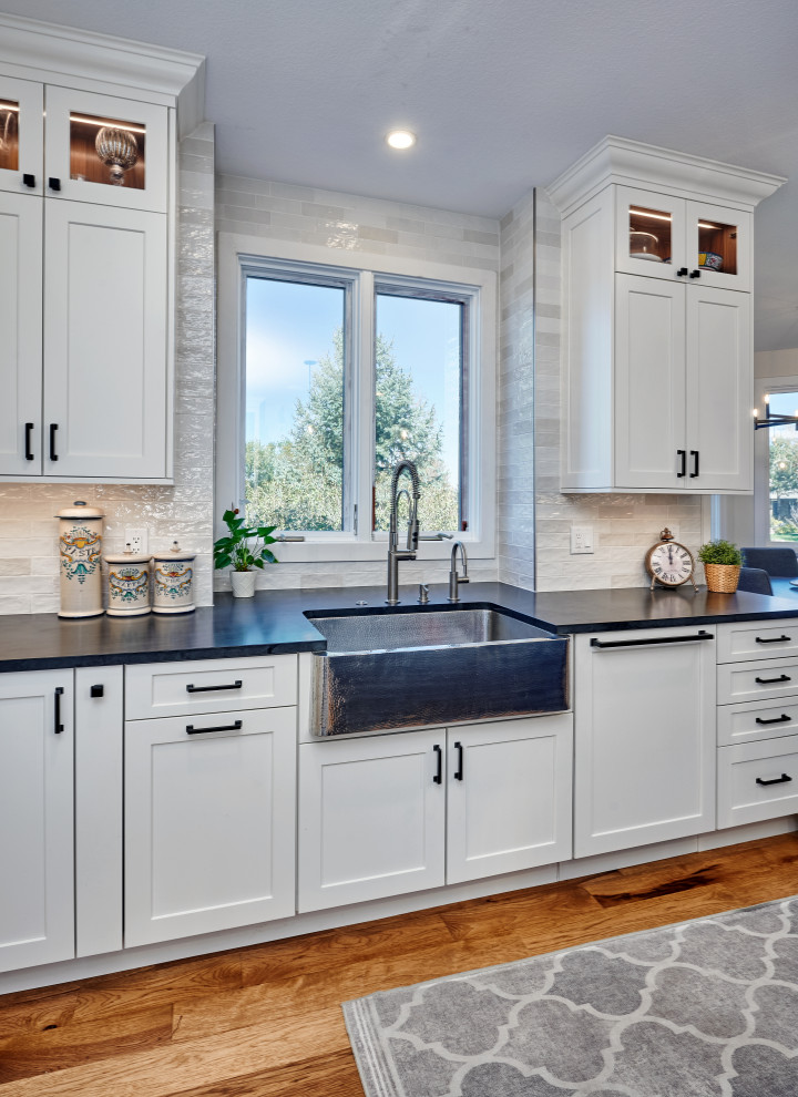 Transitional laundry room photo in Denver